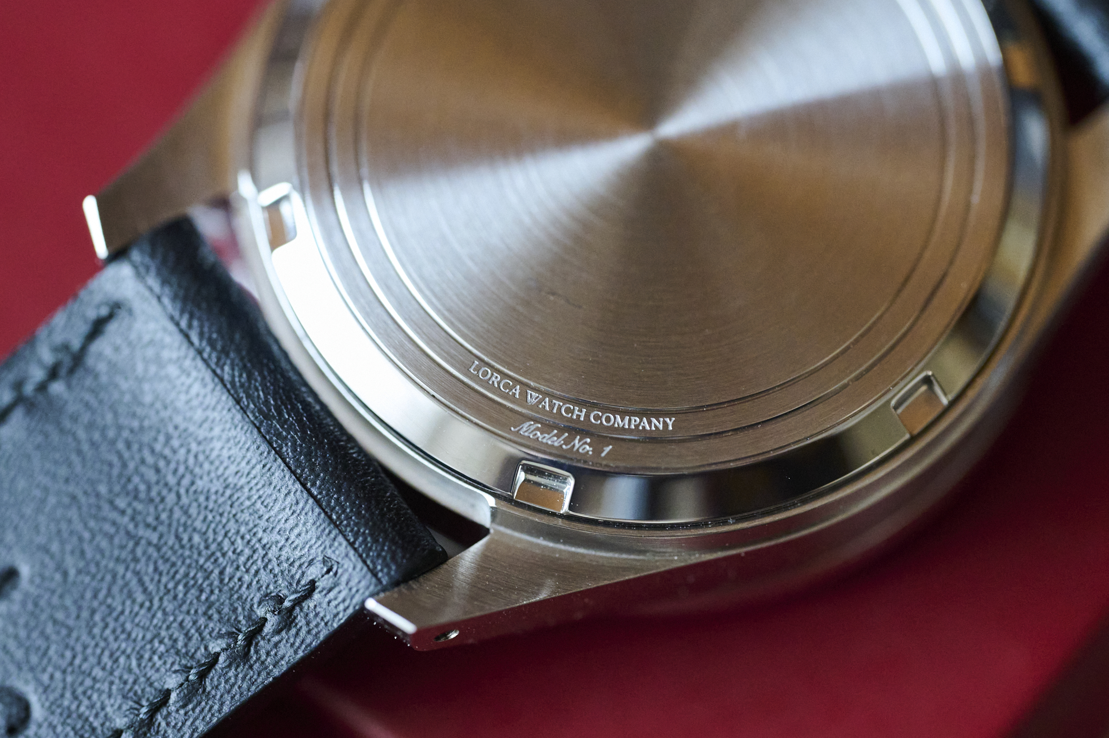 The caseback of a Lorca GMT watch