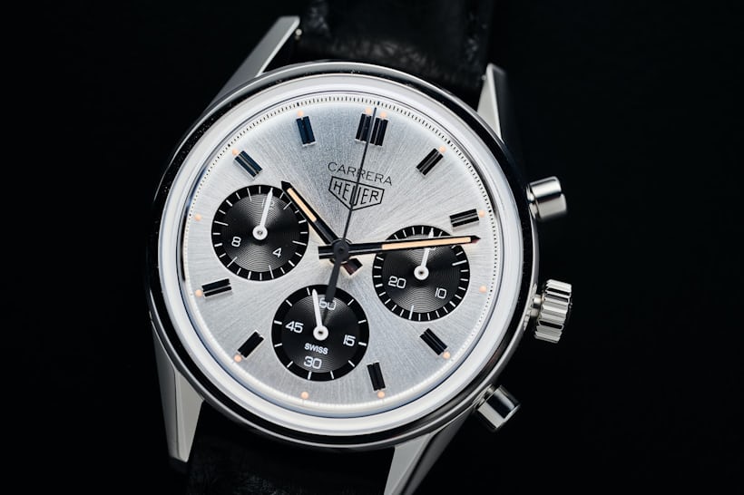 The TAG Heuer Carrera 60th Anniversary watch on a black surface