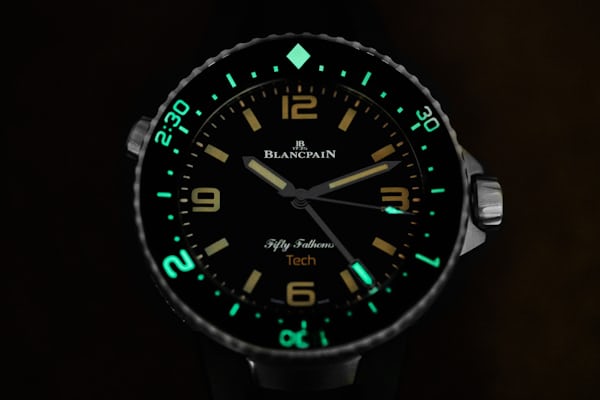 The luminous bezel glowing on a Blancpain dive watch