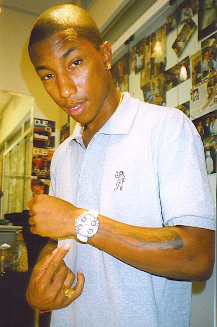 Pharrell wearing a Five Time Zone 