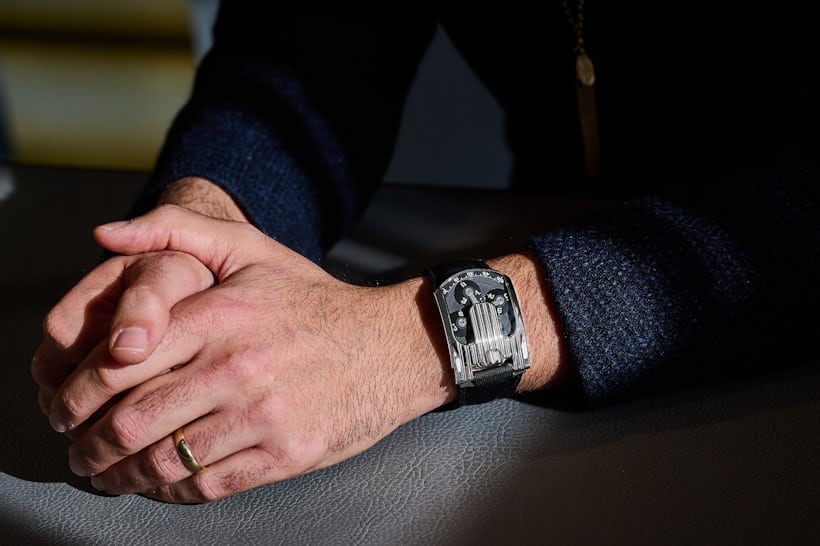 The Urwerk UR-103 Watch in white gold on the wrist of Christopher Daaboul