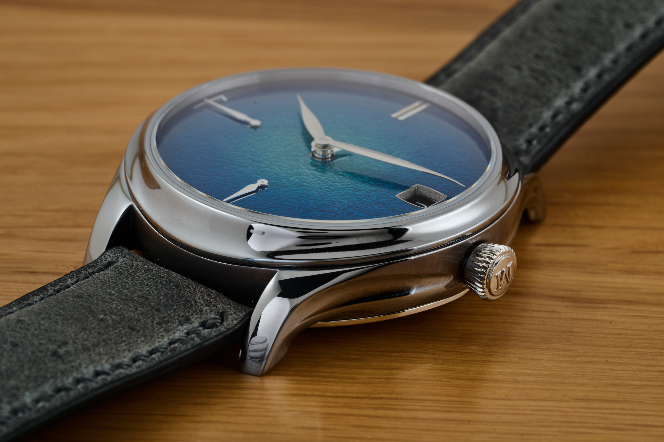 The case of the new Moser Endeavor Perpetual Calendar with fumé grand feu enamel dial