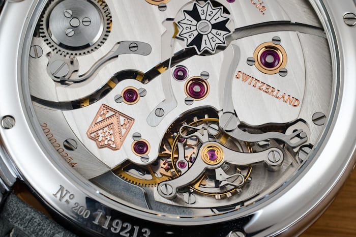The escapement of the The new Moser Endeavor Perpetual Calendar with fumé grand feu enamel dial