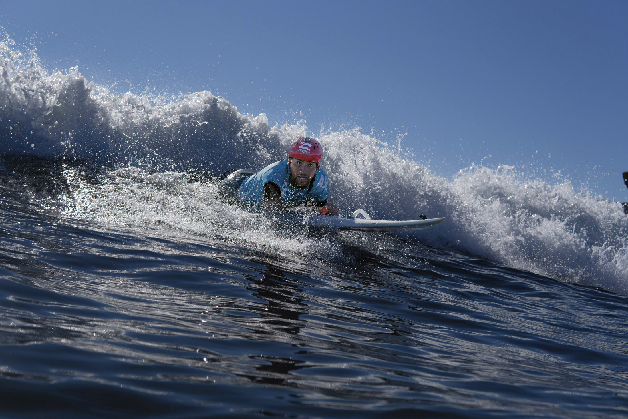 A person surfing as a part of the One More Wave group