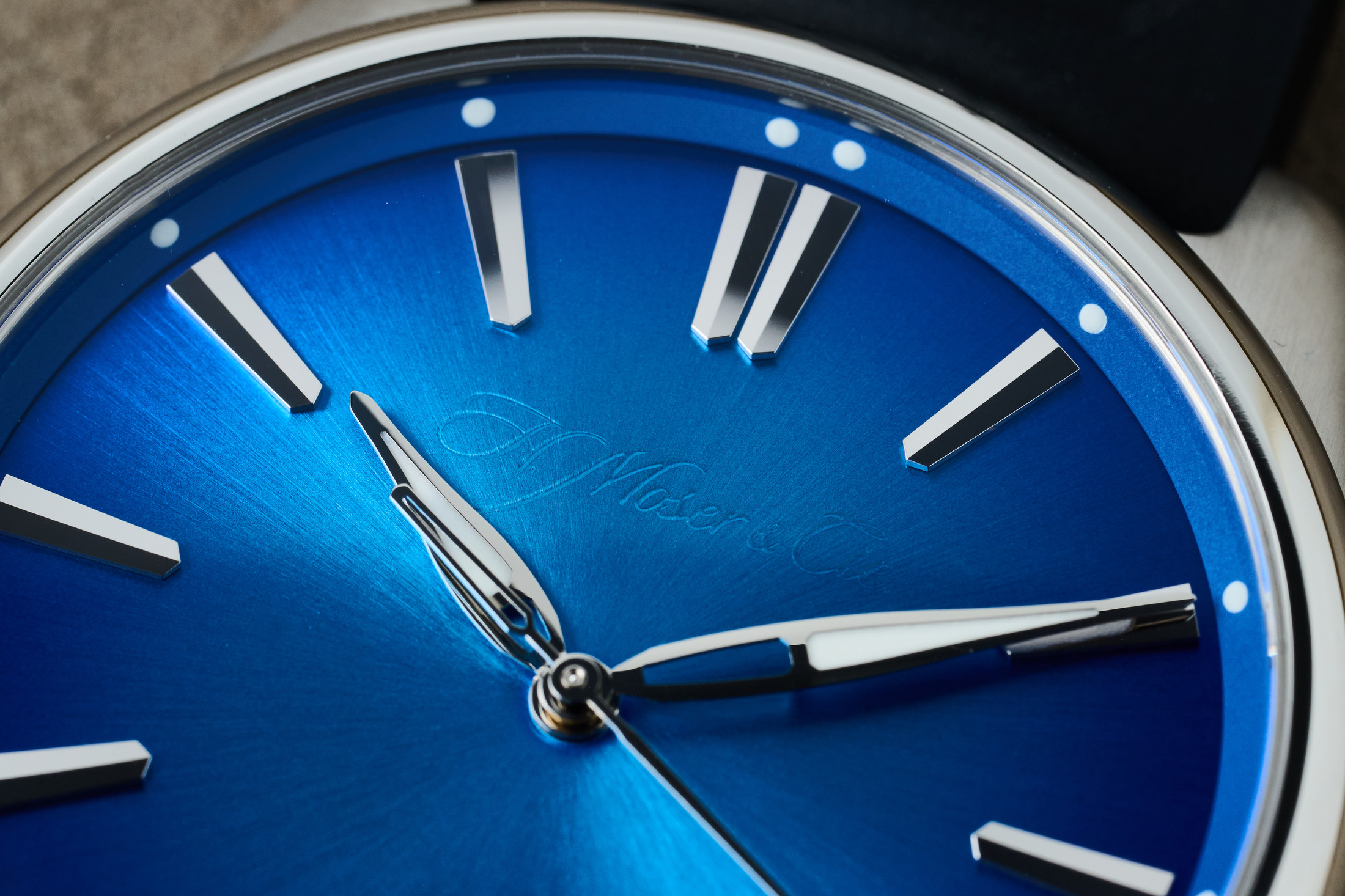 Detail on the dial of the Moser Pioneer Center Seconds