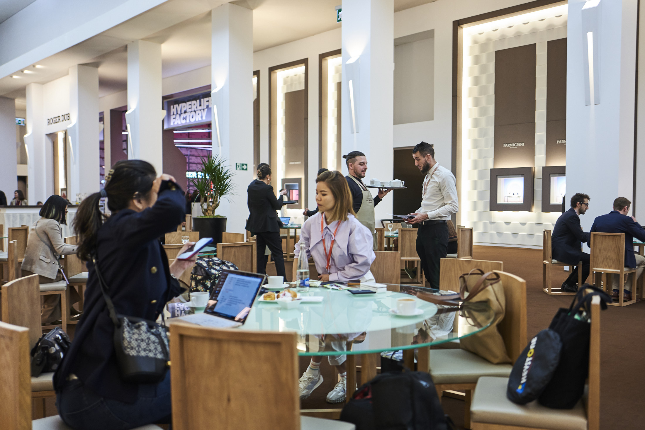 People sitting at tables at the Palexpo