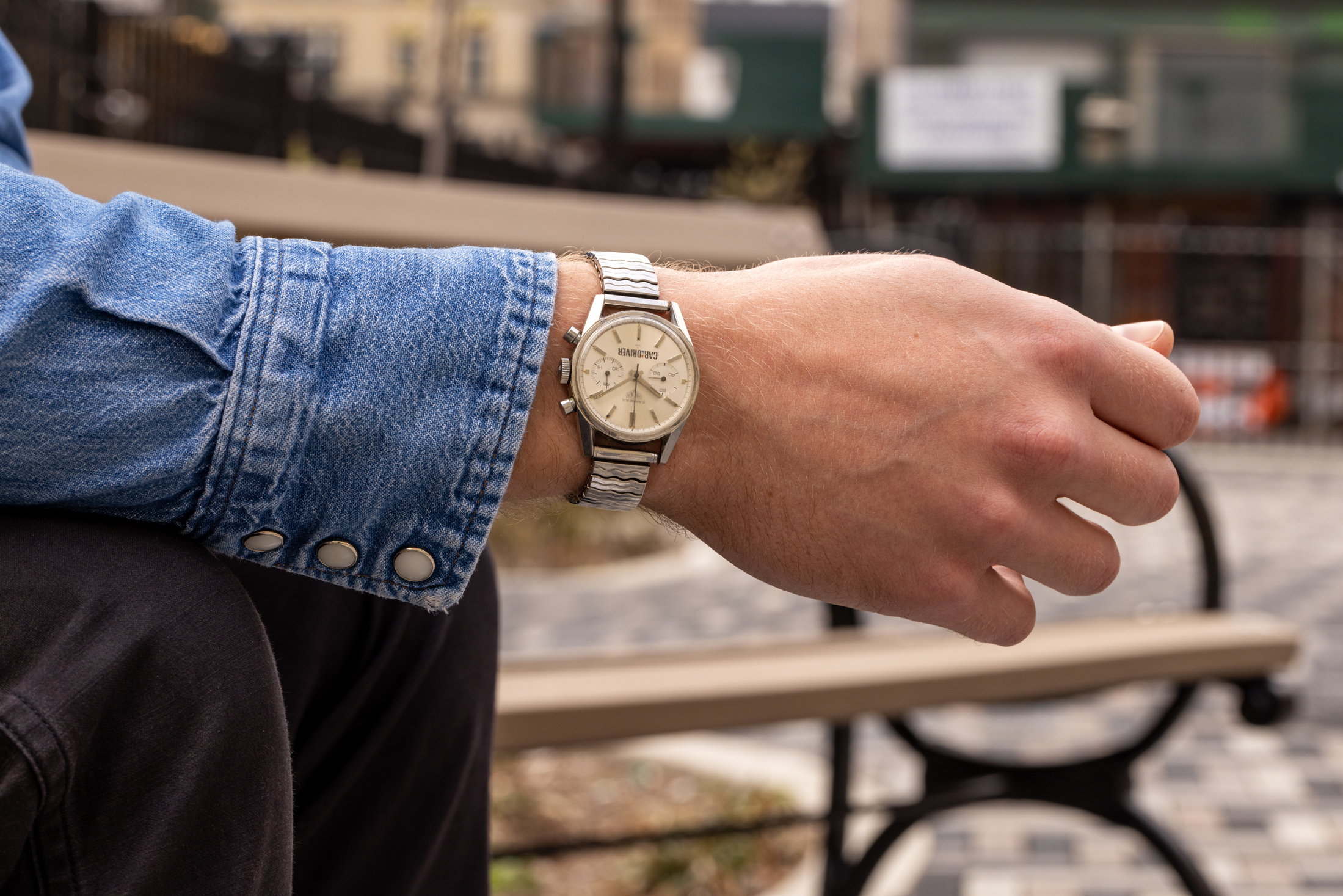 A vintage Heuer Carrera with Car and Driver dial on the wrist