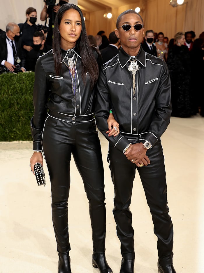Pharrell and wife at the Met Gala wearing RM 