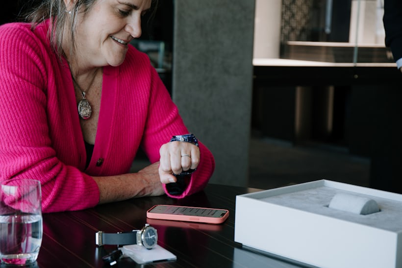 the author trying a hublot on her wrist. 