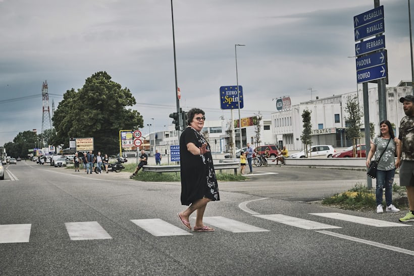 A woman blocks the road