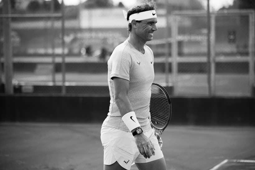 Rafael Nadal playing tennis in an RM 27-05