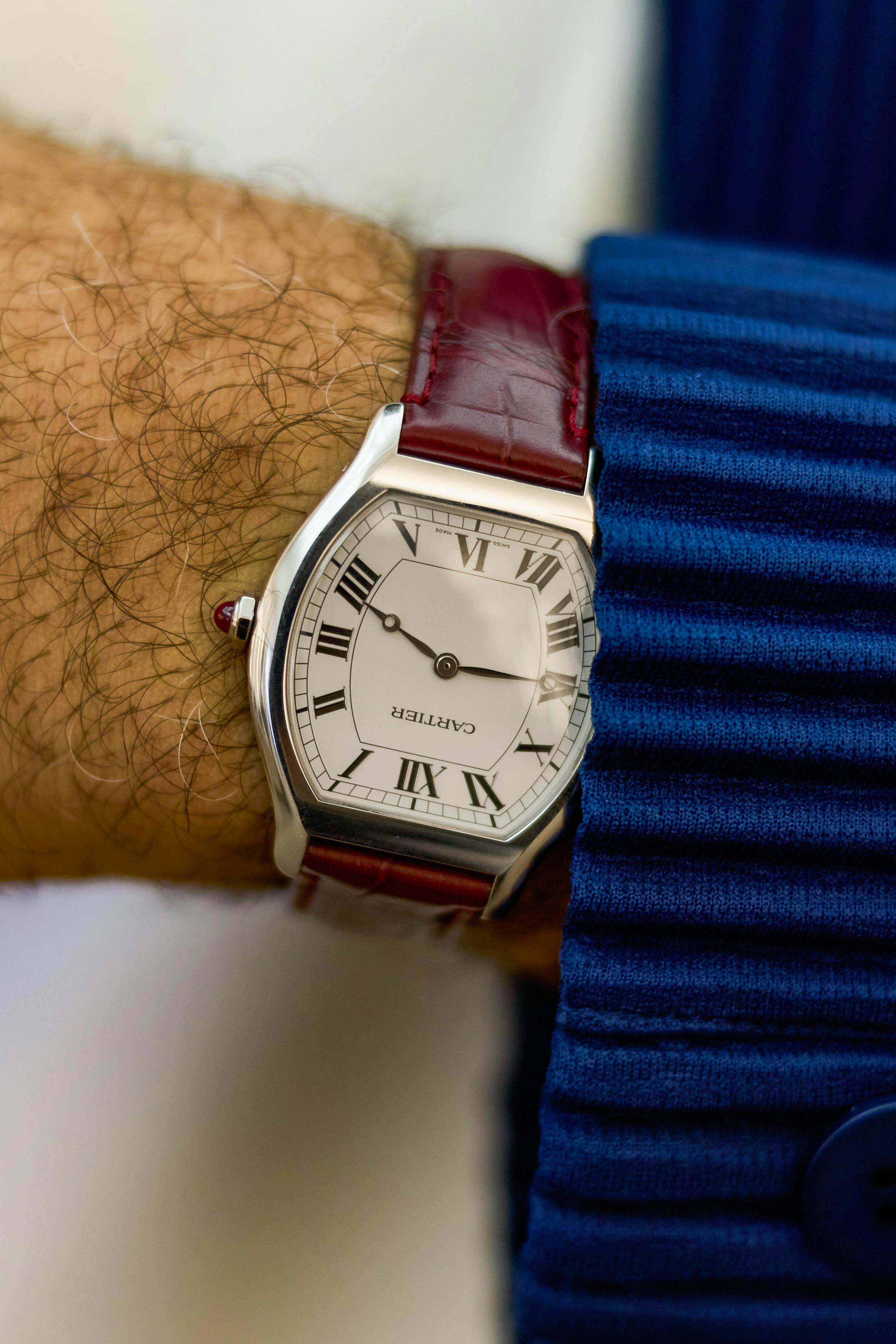 Paired flawlessly with a Cartier Tortue in Platinum