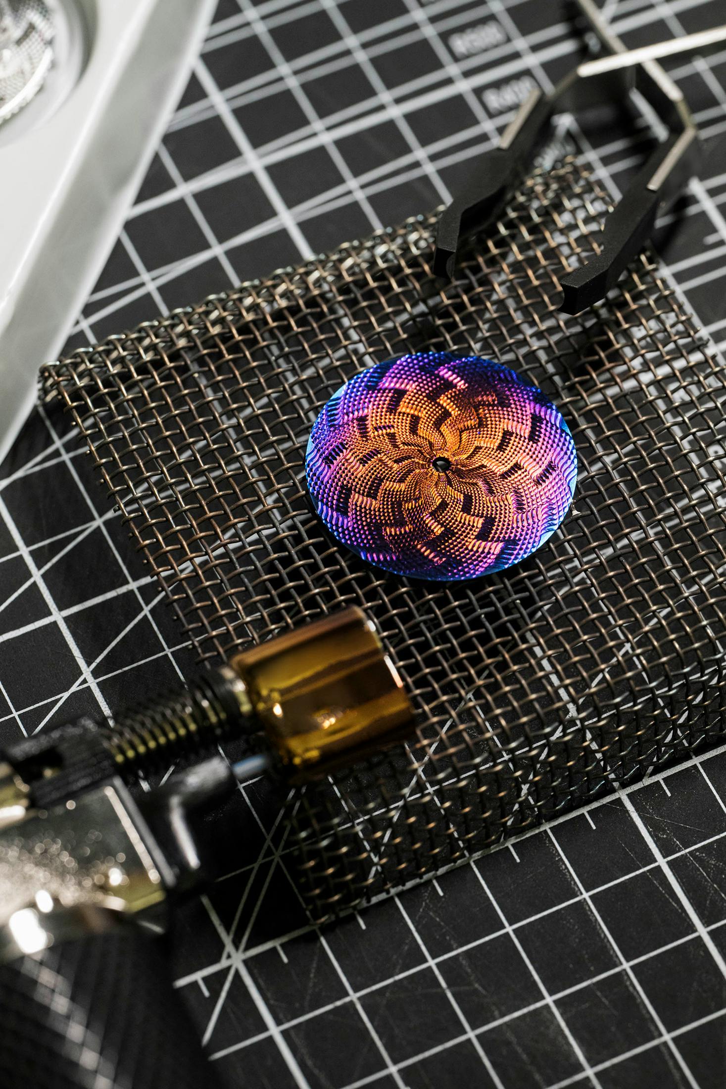 Lightning dial is crafted from grade-2 titanium and individually engine-turned by hand on a traditional rose- engine lathe using a pattern called “Lightning guilloché.”