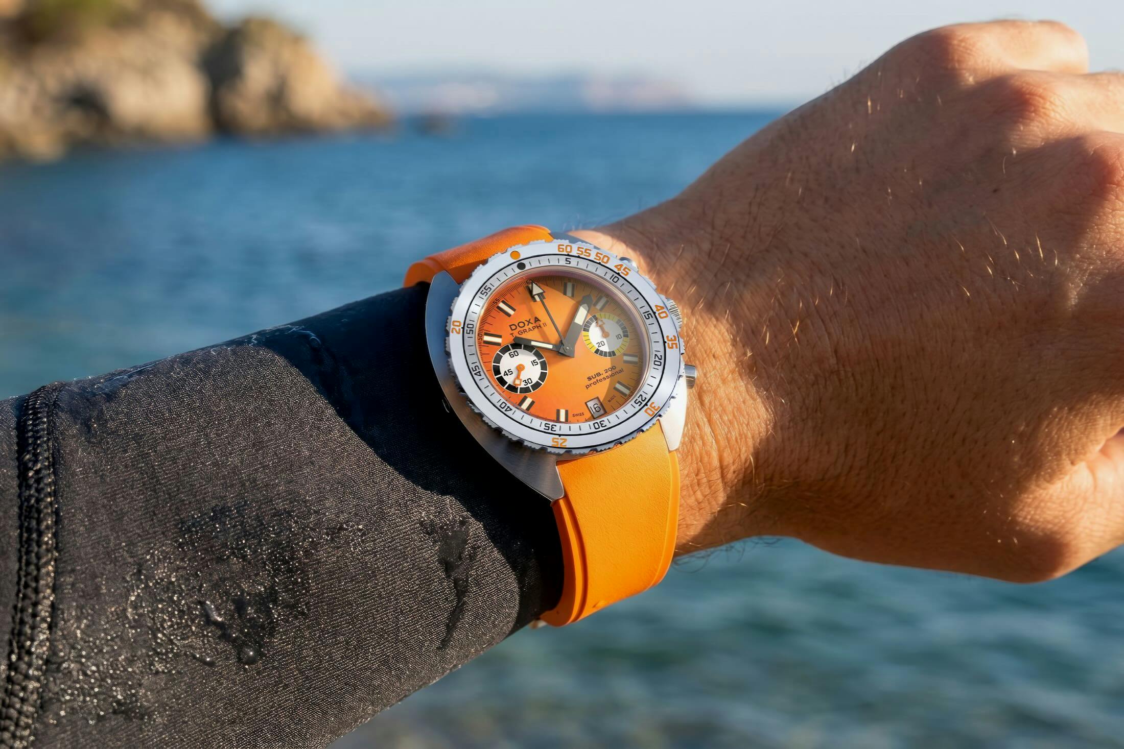 Doxa Sub 200 Tgraph II Orange Strap on wetsuit