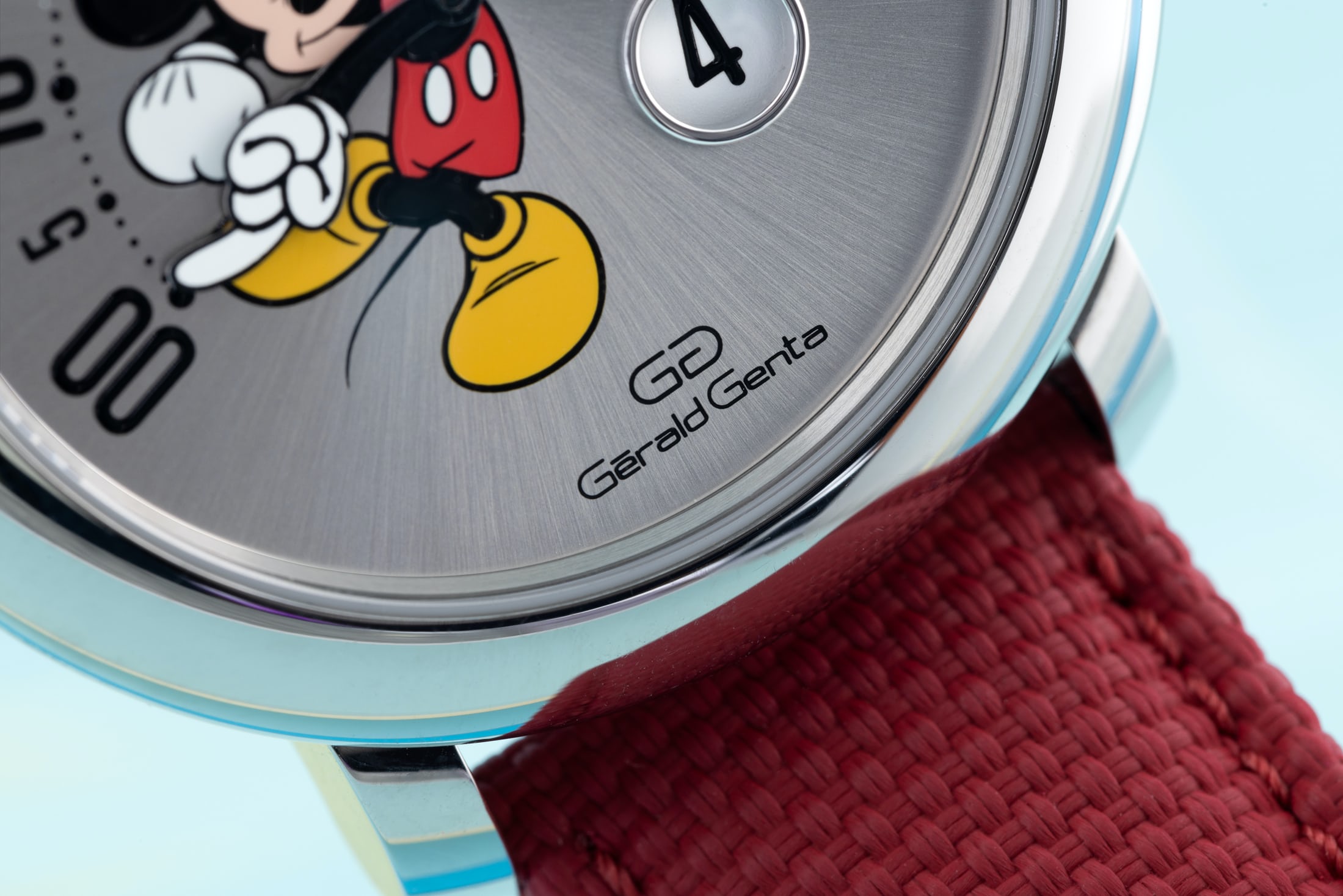 Bulgari Gérald Genta Arena Retrograde With Smiling Disney Mickey Mouse closeup of Mickey's hand