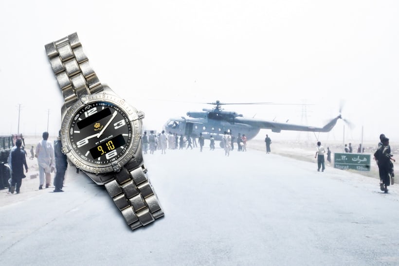 A Breitling watch on a photo of a helicopter