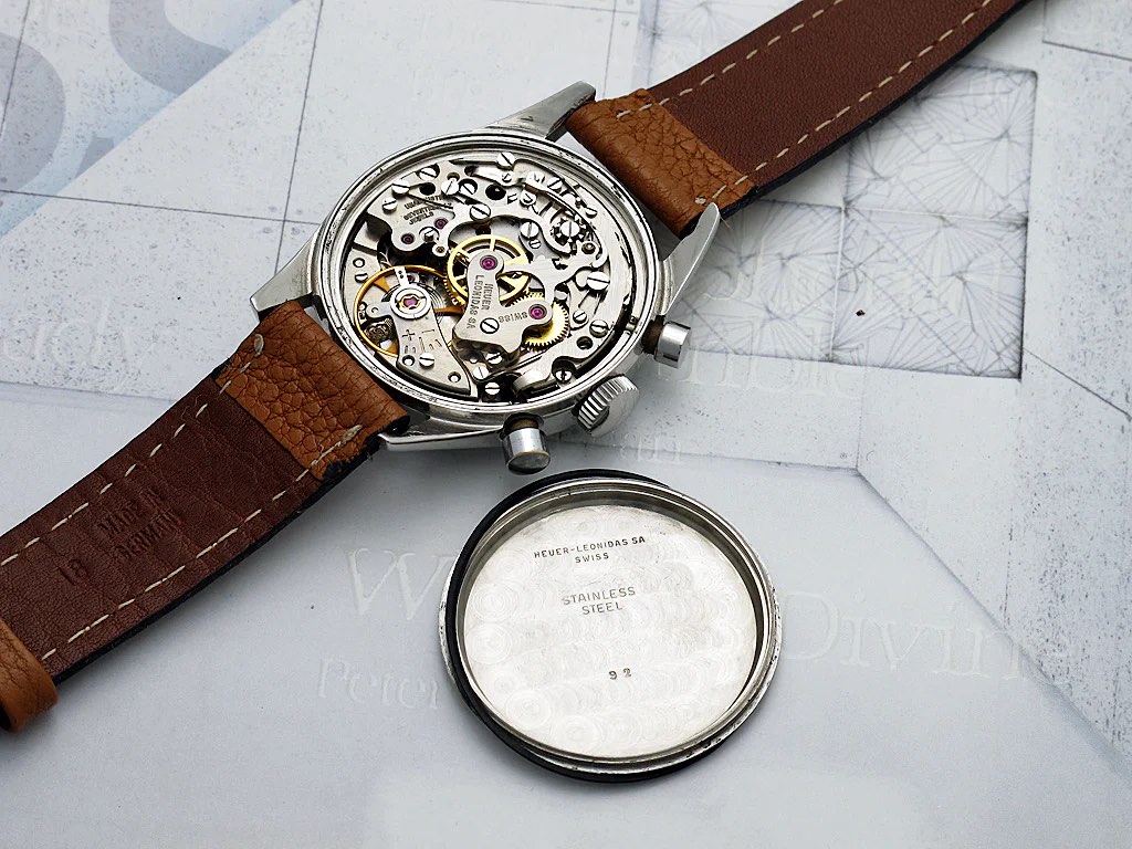 Open caseback of a Heuer ref 3647 displaying the caliber valjoux 92
