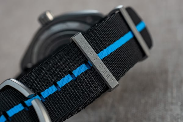 the sighed titanium hardware of the included NATO strap