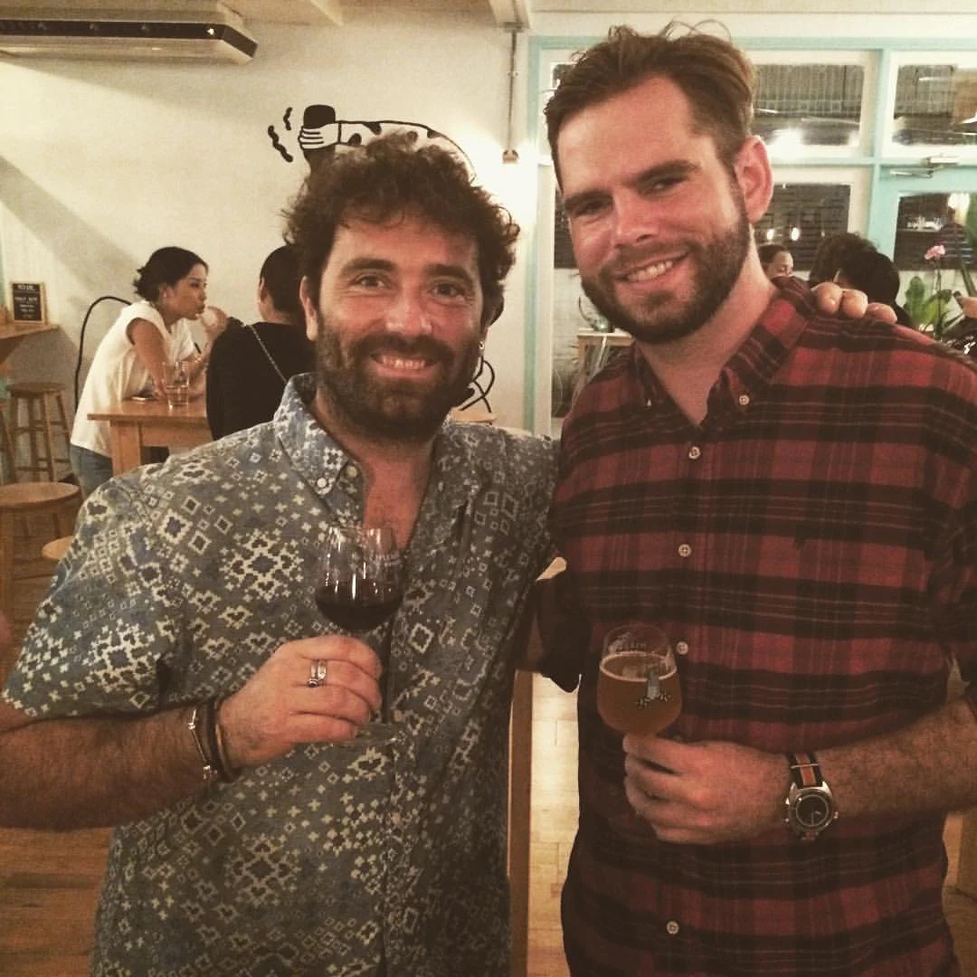 two bros, one with a watch