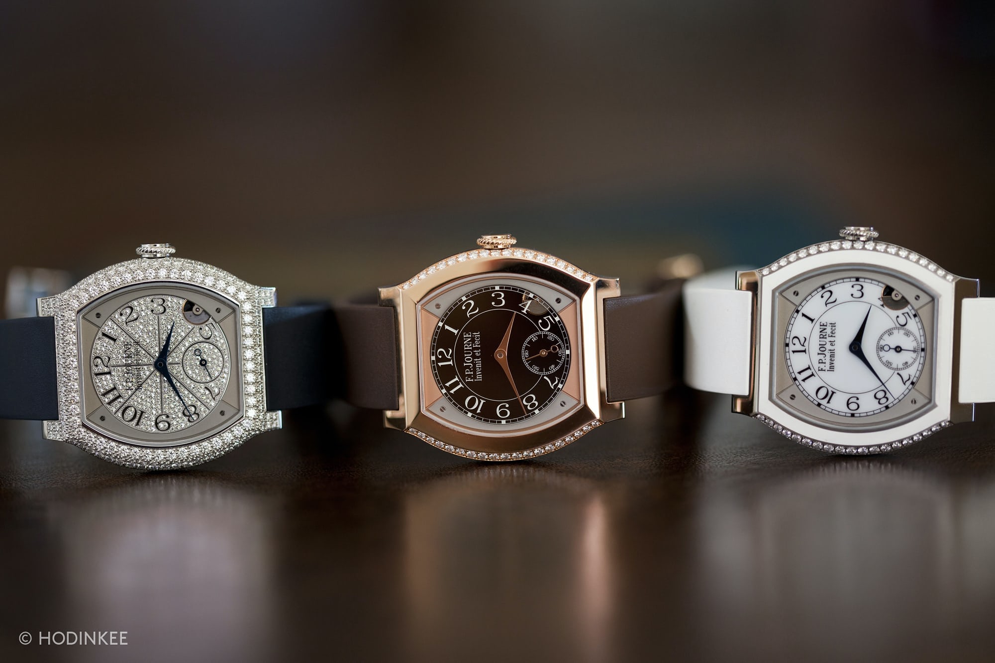 Three FP Journe Élégante examples lined up next to each other.