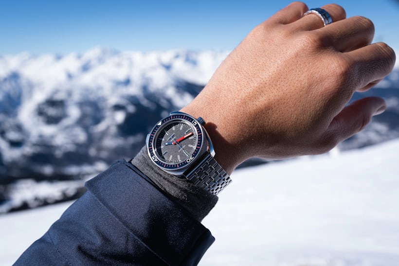 watch on wrist with snowy background