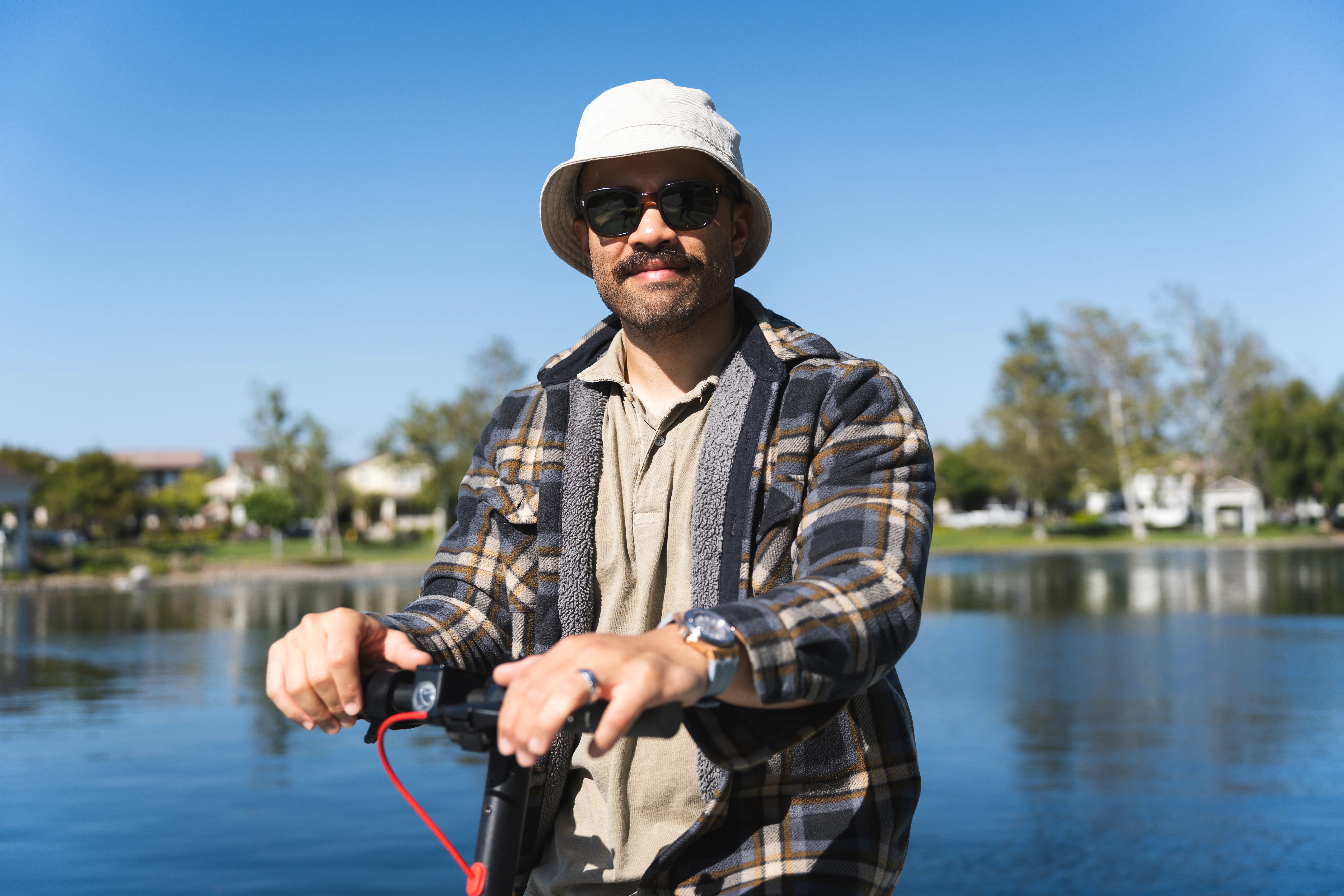 person standing on scooter