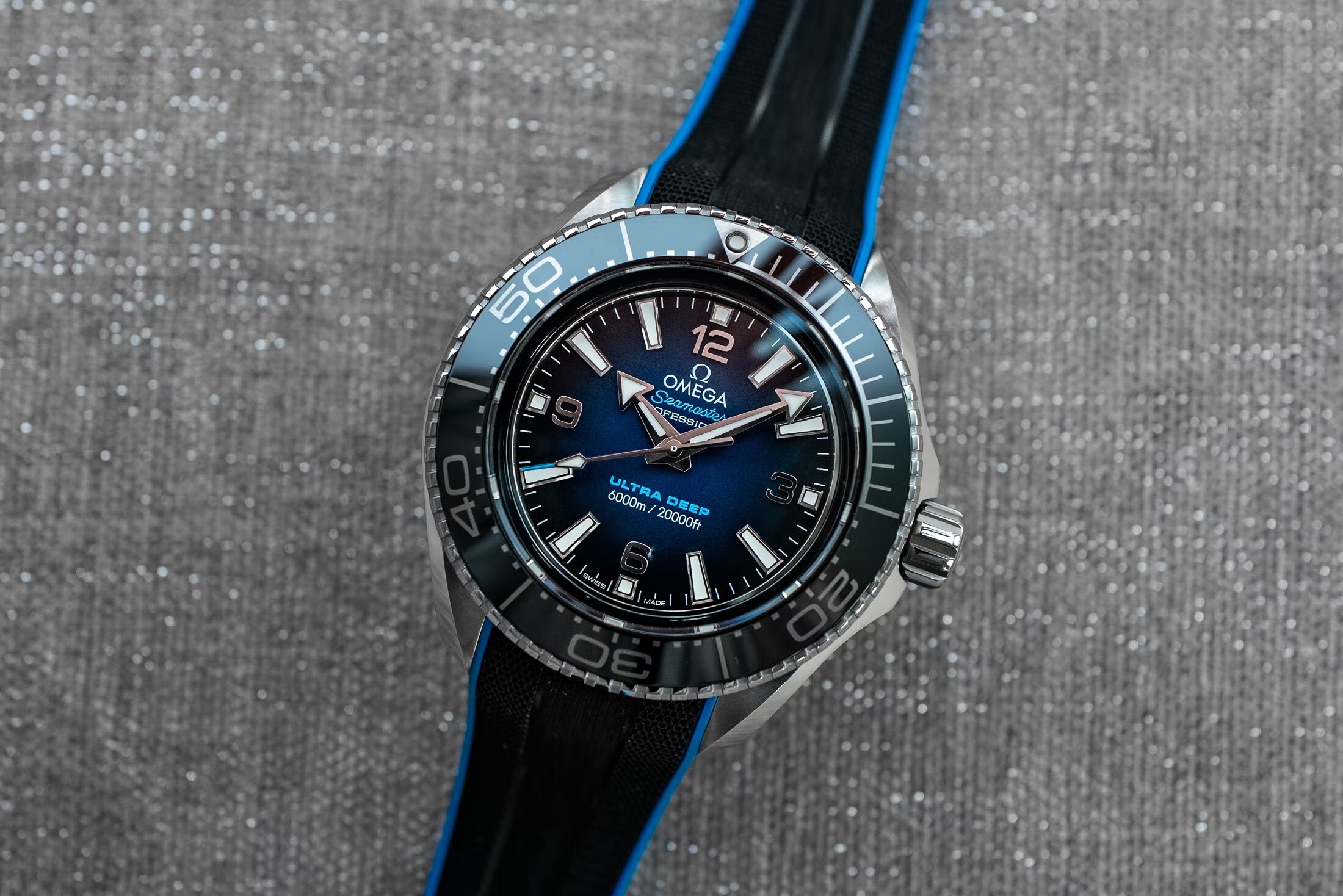 the blue dial ultra deep on a table
