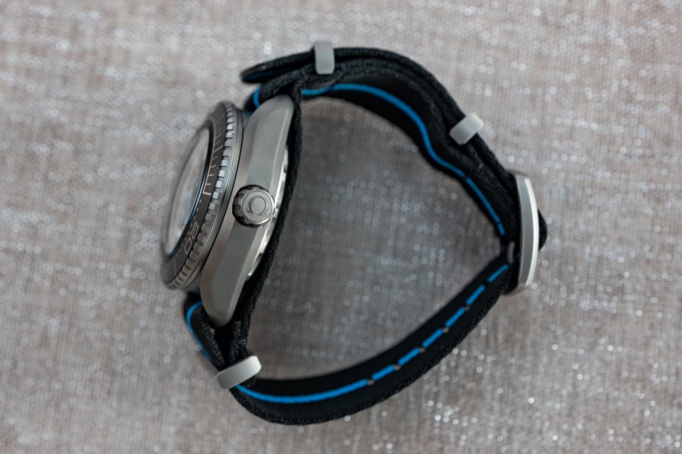 case and strap profile of ultra deep titanium