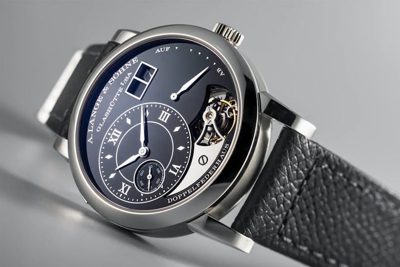 A. Lange & Söhne Reference 704.048 Lange, extremely rare, platinum tourbillon watch with large date display, limited edition of 20 pieces, serial number 16, to commemorate the twentieth anniversary of the release of "Lange 1". With warranty and watch box