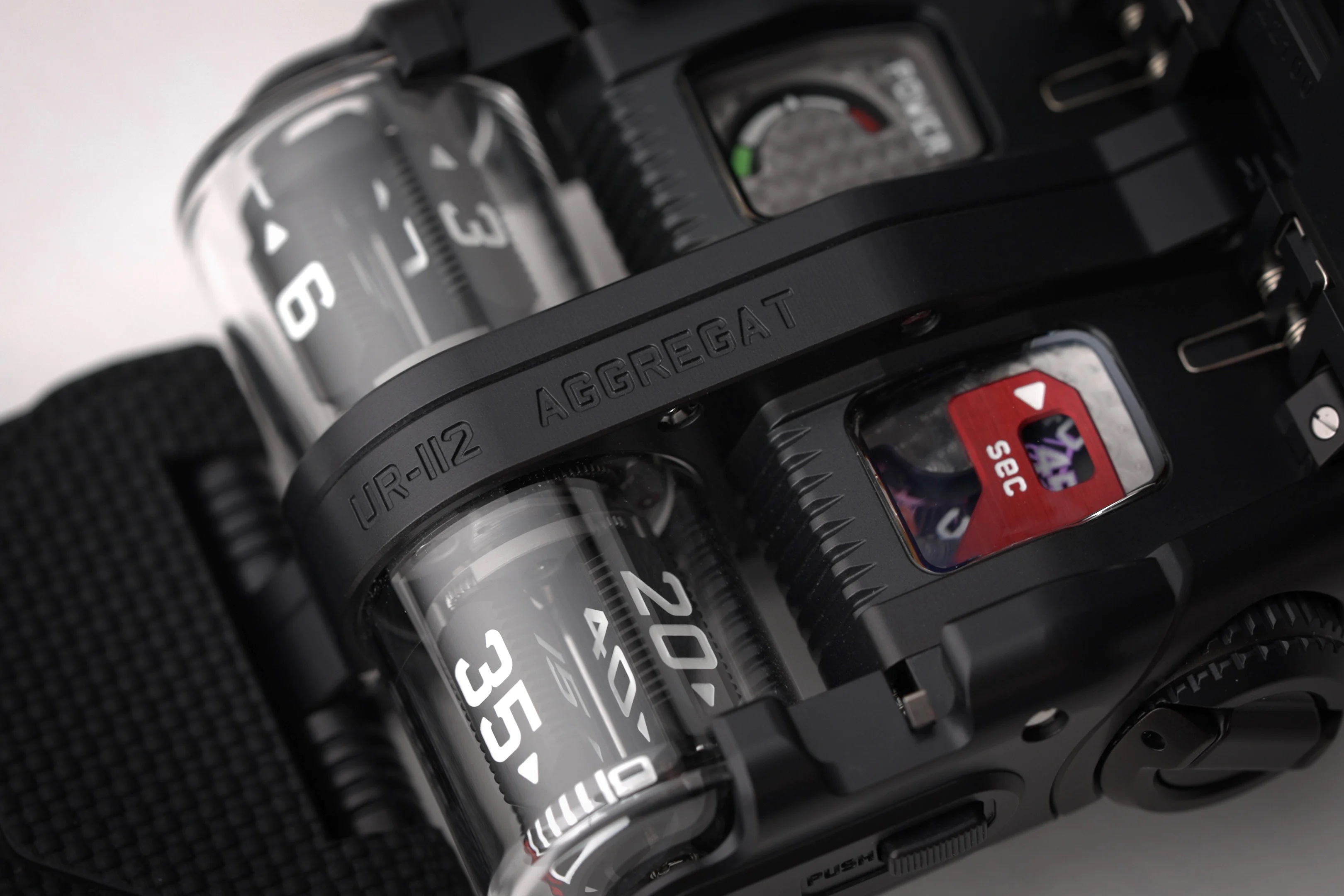 close up of top of watch with hood open