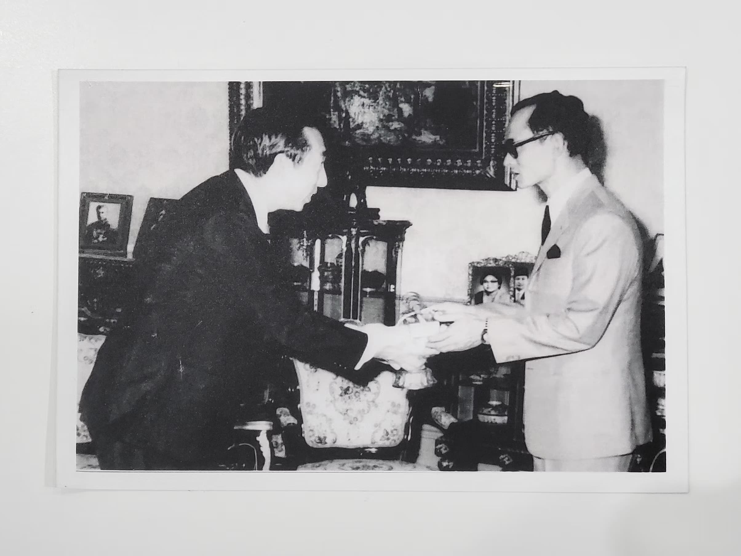 Two guys chatting watches. Both very powerful. 