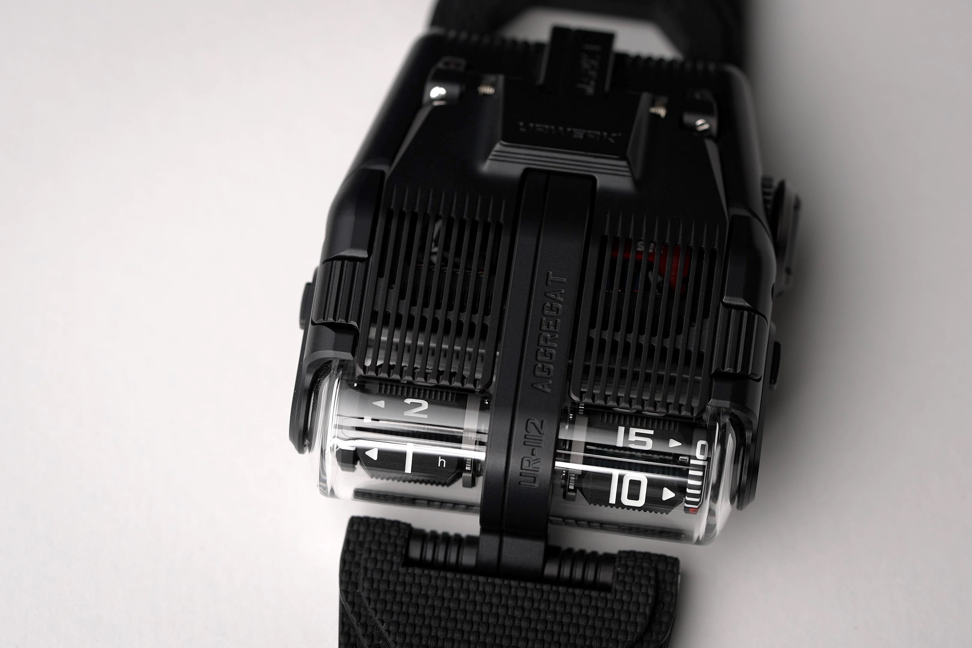 top of watch on white surface